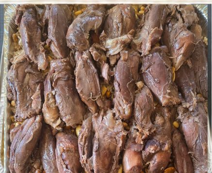 Catering tray of slow-cooked lamb and beef